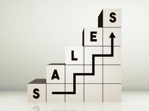 "SALES" blocks arranged in ascending stairs with black arrow showing upward progress.